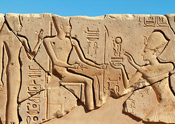 Seti I offering to Amun and Mut