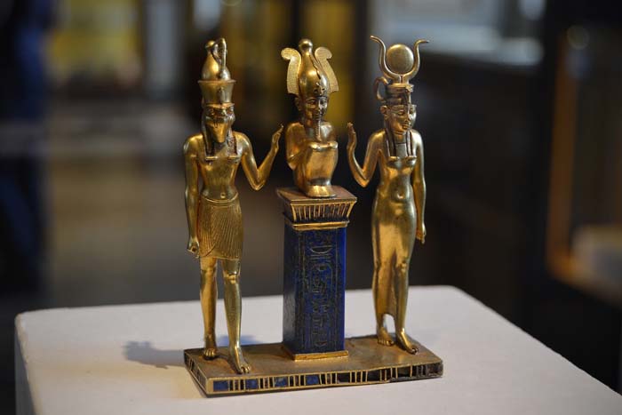 Osiris, with Isis and Horus