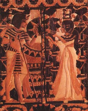 King Tut receving flowers from Ankhesenamun as a sign of love