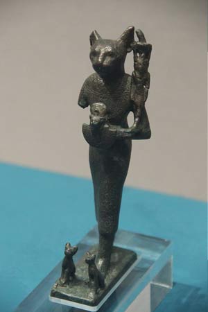 Bronze Statue of the Goddess Bastet with kittens at her feet.